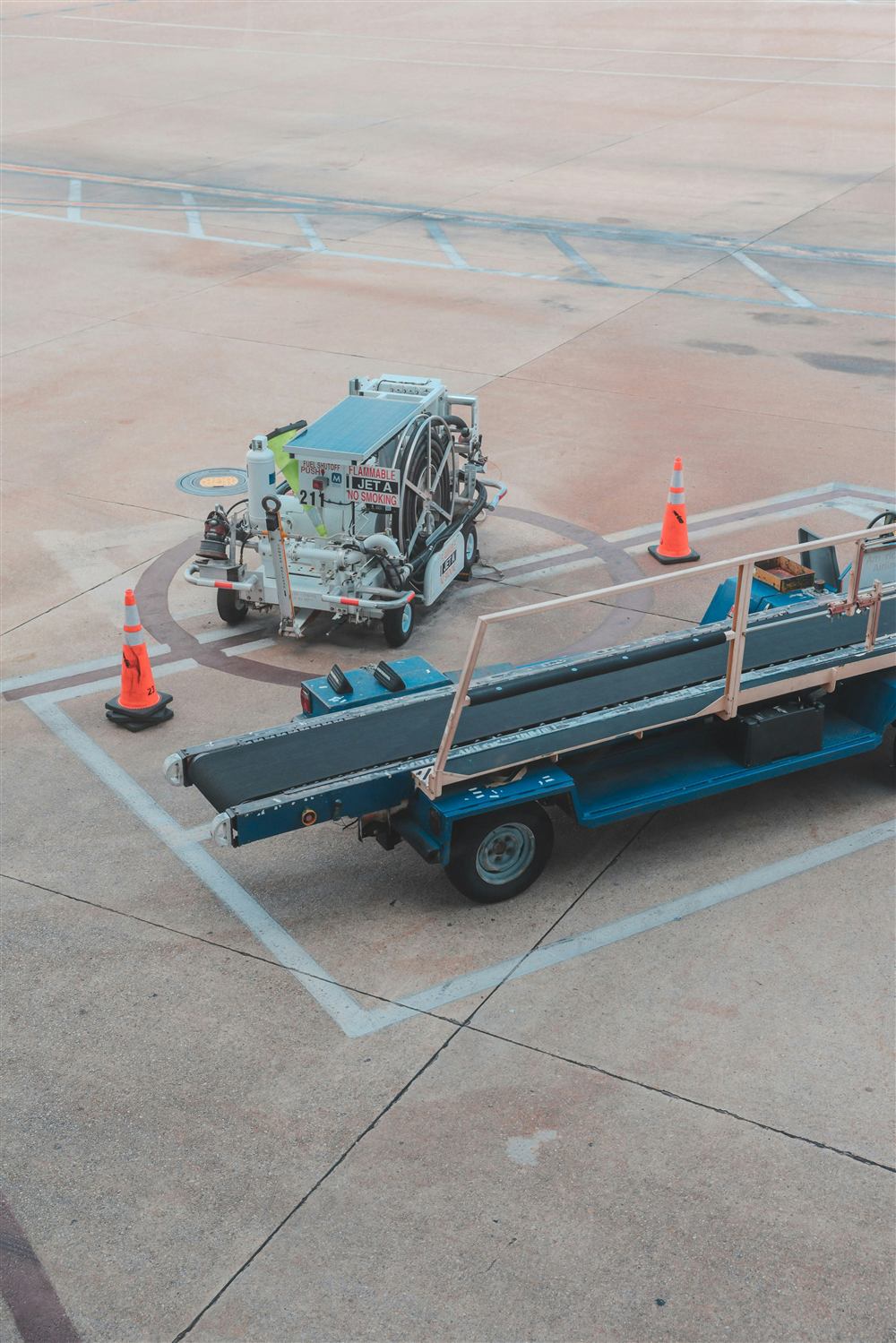Ground support equipment staged on an airport tarmac.